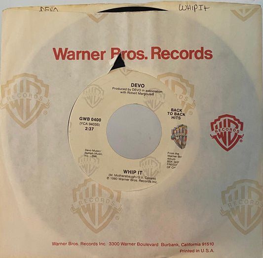 Devo – Whip It / Girl U Want (7", usado, EE.UU.)
